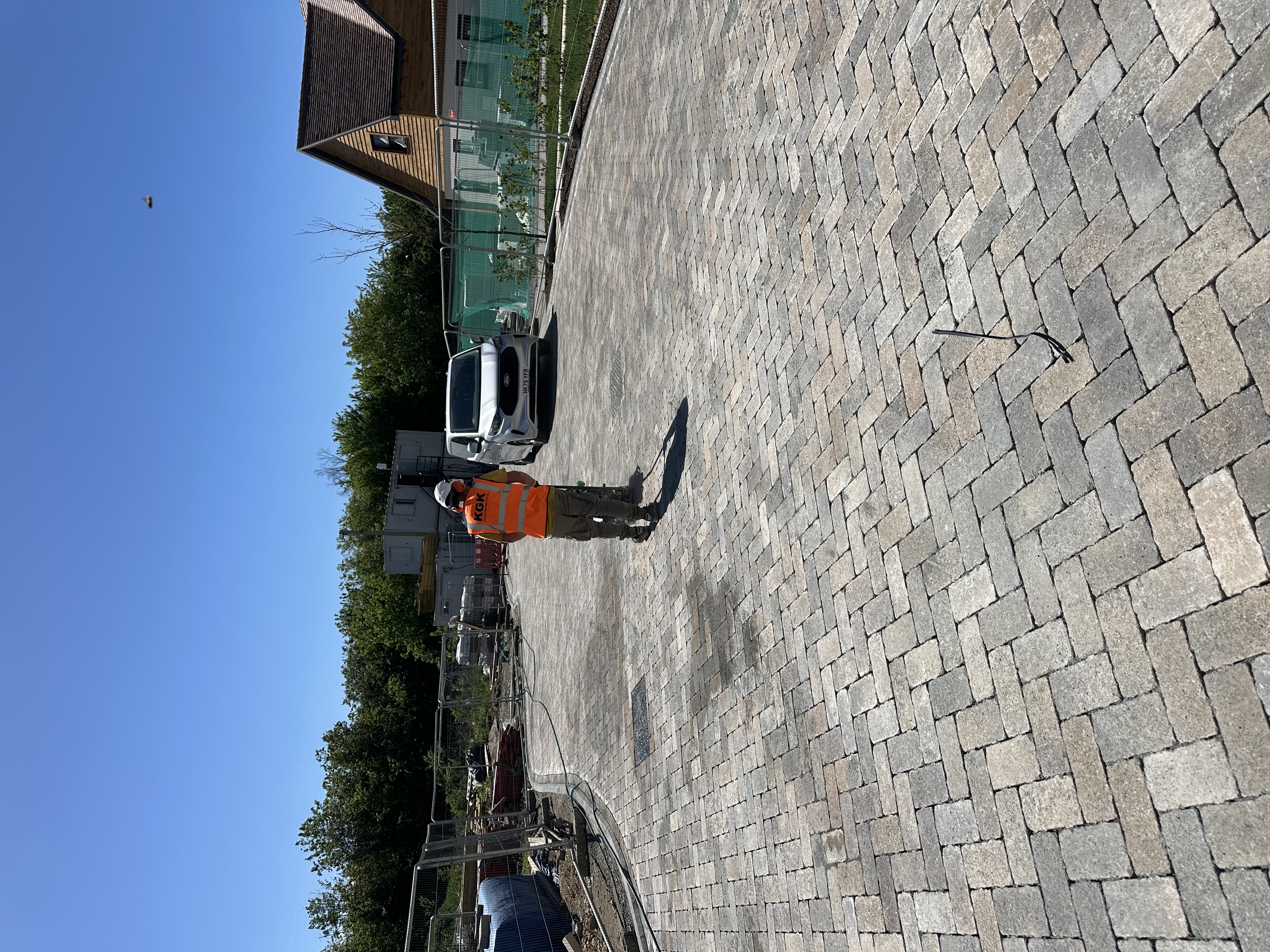 KGK paving operative on completed block paving project