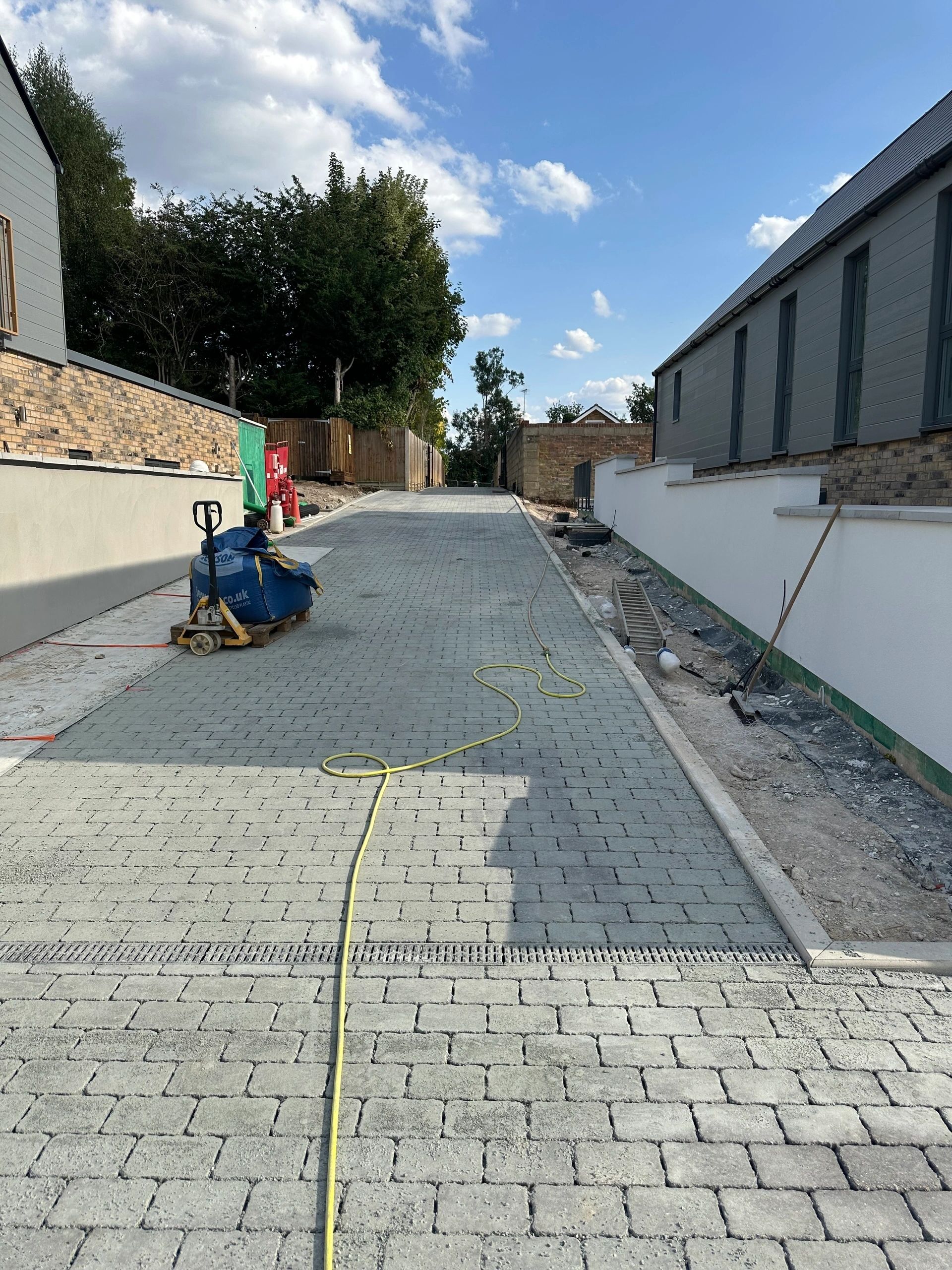 KGK newly paved driveway with grey pavers